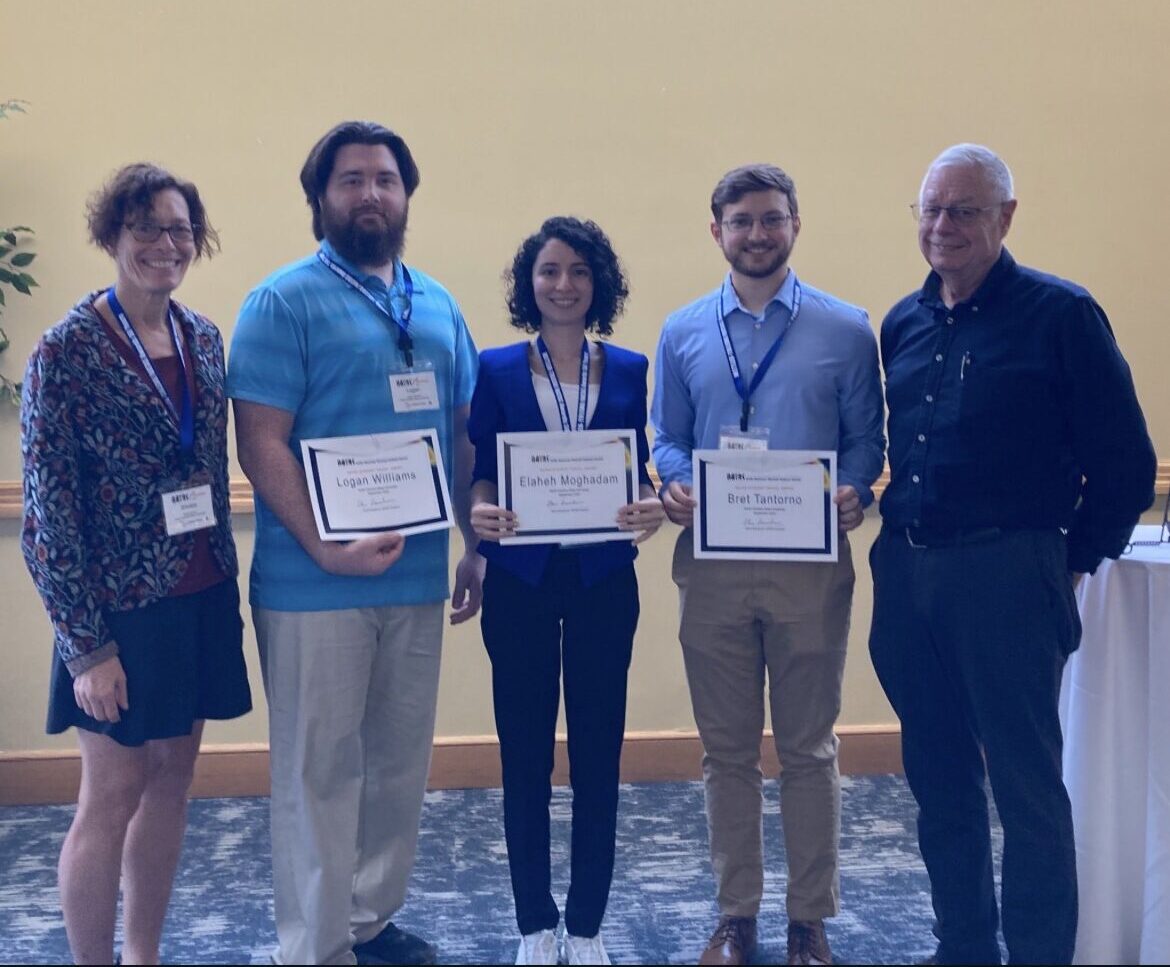 A group of graduate students with their advisors.